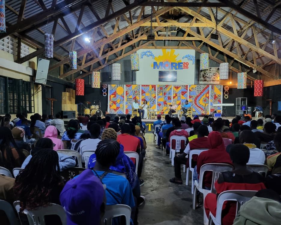 A conference hall full of young people